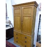 A 19TH C PINE LINEN PRESS PAINTED IN OCHRE WITH FAUX BOIS GRAINING, THE DOORS TO THE TOP ENCLOSING