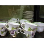 A ROYAL DOULTON GLAMIS THISTLE PATTERN TEA SERVICE, THE TWELVE PLACE SETTINGS DESIGNED BY P CURNOCK,