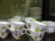 A ROYAL DOULTON GLAMIS THISTLE PATTERN TEA SERVICE, THE TWELVE PLACE SETTINGS DESIGNED BY P CURNOCK,