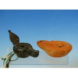 A ROMAN BRONZE OIL LAMP WITH HANGING CHAIN AND LEAF SHAPED HANDLE. W 11.5cms. TOGETHER WITH A