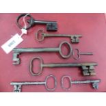 A COLLECTION OF NINE 17th CENTURY AND LATER IRON KEYS,TOGETHER WITH TWO CLOCK KEYS THE LARGEST. W