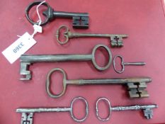 A COLLECTION OF NINE 17th CENTURY AND LATER IRON KEYS,TOGETHER WITH TWO CLOCK KEYS THE LARGEST. W