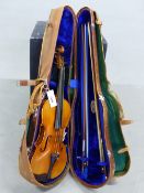 A STRADIVARIUS LABELLED VIOLIN WITH TWO BOWS IN A RUSHWORTH AND DREAPER LEATHER CASE WITH CANVAS