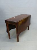 A GEORGIAN MAHOGANY SERPENTINE EDGED FLAP TOP TABLE, THE TAPERING SQUARE LEGS CHANNELLED AT THE CORN