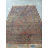 AN ANTIQUE BELOUCH MAIN CARPET, 300 x 184cms. TOGETHER WITH AN ANTIQUE PERSIAN FEREGHAN RUNNER,