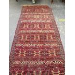 A YOMOUD TURKOMAN RUG. 279 x 119cms.