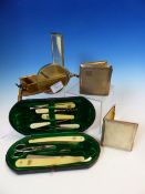 A CASED MAGNIFYING GLASS, TWO OTHERS, TWO SILVER CIGARETTE CASES, THREE BOTTLE LABELS, A PARK LANE