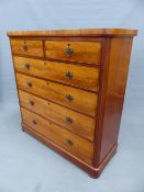 A VICTORIAN MAHOGANY CHEST OF TWO SHORT AND FOUR LONG DRAWERS ON A PLINTH AND BUN FEET. W 129 x W