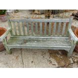 A WEATHERED TEAK GARDEN BENCH, BY LISTER.