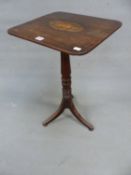 A REGENCY MAHOGANY WINE TABLE WITH THE RECTANGULAR TOP CENTRALLY INLAID WITH A CONCH SHELL, THE RING