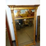 A 19th C. RECTANGULAR MIRROR IN GILT CLUSTER COLUMN FRAME, THE VERRE EGLOMISE PANEL BELOW THE BEADED