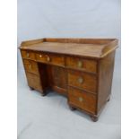 AN EARLY 19th.C. MAHOGANY PEDESTAL DESK, THE THREE QUARTER GALLERIED TOP OVER A CENTRAL DRAWER AND