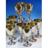 A SET OF TWELVE HALLMARKED SILVER GOBLETS WITH ENGRAVED SWAG DECORATION, DATED 1972-1973 LONDON.