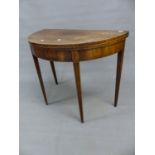 A REGENCY MAHOGANY AND BOXWOOD BANDED DEMI LUNE FOLD OVER CARD TABLE ON SQUARE TAPERED AND FLUTED