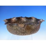 AN INDIAN 900 GRADE SILVER PINCHED RIM AND REPOUSSE DECORATED OVAL FORM BOWL, JUNGLE, ANIMAL AND