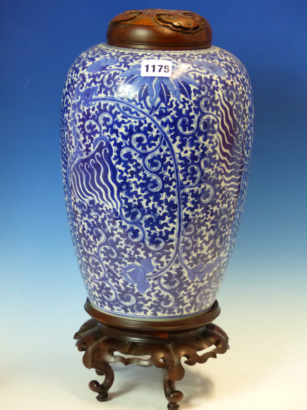 A CHINESE BLUE AND WHITE OVOID JAR, WOOD COVER AND STAND, PAINTED WITH THREE PHOENIX AMONGST - Image 4 of 14