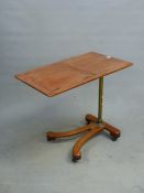 A LATE VICTORIAN MAHOGANY READING TABLE TO SLIDE OVER A BED, THE RECTANGULAR TOP WITH TWO EASEL BAC