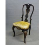AN EARLY 18th C. CHARCOAL PAINTED CHAIR WITH GILT FOLIAGE DETAILING, THE VASE SPLAT ABOVE DROP IN