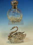 A GLASS AND SILVER HALLMARKED SWAN FORM SALT WITH ARTICULATED WINGS, TOGETHER WITH A SILVER