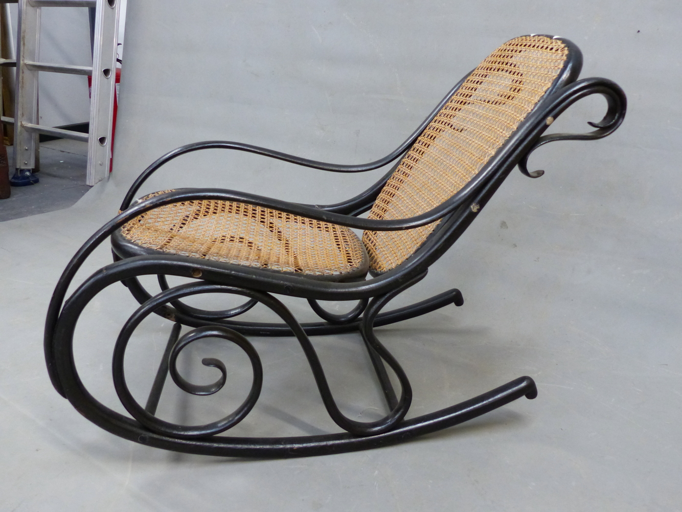 A THONET STYLE EBONISED BENT WOOD ROCKING CHAIR WITH CANED BACK AND SEAT - Image 7 of 15