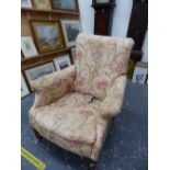 A VICTORIAN UPHOLSTERED DEEP SEAT ARMCHAIR ON TURNED LEGS, TOGETHER WITH AN ANTIQUE BUTTON BACK