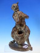 A BRONZED TERRACOTTA FIGURE OF A SATYR SEATED ON A VASE PLAYING PAN'S PIPES, AFTER F W POMEROY. H