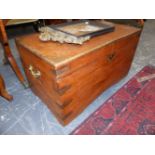 AN ANTIQUE CAMPHOR WOOD CHEST WITH BRASS MOUNTS