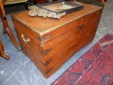 AN ANTIQUE CAMPHOR WOOD CHEST WITH BRASS MOUNTS