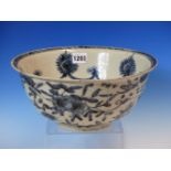 A WANLI BLUE AND WHITE BOWL, THE INTERIOR WITH SWAGS HELD BY ALTERNATING ROSETTES AND RUYI