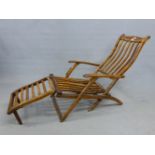 A CUNARD TEAK DECK CHAIR WITH FOLD OUT FOOT REST