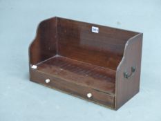 A 19th C. ROSEWOOD TWO HANDLED BOOK TROUGH, A DRAWER BELOW FITTED FOR WRITING WITH INKWELL AND