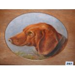 LATE 19th.C. ENGLISH NAIVE SCHOOL. A PAIR OF OVAL DOG PORTRAITS. OIL ON BOARD. 23 x 27cms (2).