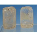 A PAIR OF ARABIC ROCK CRYSTAL CHESS PIECES WITH HEART SHAPED TOPS TO THE COLUMNAR SHAPES. H 5cms.