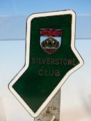 A RARE SILVERSTONE CAR CLUB ENAMEL CAR BADGE, BY MARPLES AND BRASLEY, No. 218, A BRITISH MOTOR