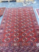 AN ANTIQUE TEKKE BOKHARA MAIN CARPET. 280 x 200cms.