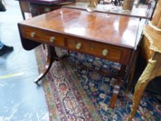 A REGENCY MAHOGANY SOFA TABLE, THE ROUNDED RECTANGULAR FLAP TOP OVER TWO DRAWERS, THE RECTANGULAR