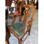 A SET OF FOUR CHIPPENDALE STYLE MAHOGANY DINING CHAIRS INCLUDING TWO WITH ARMS, THE PIERCED VASE