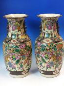 A PAIR OF CHINESE CRACKLEWARE VASES PAINTED WITH WARRIORS ABOVE AND BELOW BRONZED BANDS ON THE