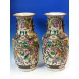 A PAIR OF CHINESE CRACKLEWARE VASES PAINTED WITH WARRIORS ABOVE AND BELOW BRONZED BANDS ON THE