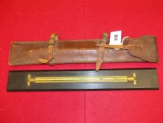 A LEATHER CASED EBONY CHARTROOM PARALLEL RULER BY HENRY JASPER REDFERN, SHEFFIELD, MOVEABLE ACROSS