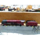 CORRECTED - AN ASTER HOBBY 'O' GAUGE 4-6-2 LOCOMOTIVE AND TENDER. NO. 6233 "DUCHESS OF SUTHERLAND"