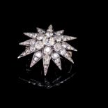 AN ANTIQUE DIAMOND STAR BURST BROOCH, SET WITH GRADUATING MIXED OLD CUT DIAMONDS. APPROX