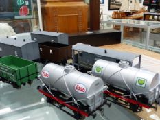 SEVEN VARIOUS GAUGE 1 WAGONS TO INCLUDE GUARDS VAN, ESSO AND BP TANKERS, TWO BOX WAGONS AND TWO OPEN