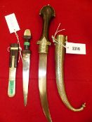 A JAMBIYA WITH WOODEN HANDLE AND NICKEL SCABBARD. 46cms. TOGETHER WITH A LEATHER HANDLED DAGGER WITH