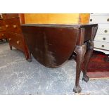 A 19th C. MAHOGANY OVAL FLAP TOP TABLE WITH CABRIOLE LEGS ON BALL AND CLAW FEET. W 113 x D 36 CLOSED