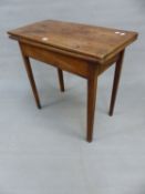 A GEORGE III MAHOGANY TEA TABLE, THE RECTANGULAR TOP OPENING ON A SINGLE GATE AND ON CHAMFERED
