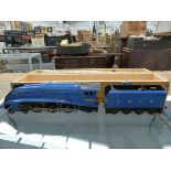 AN UNKNOWN 'O' GAUGE LOCOMOTIVE AND TENDER LNER 4-6-2 "SIR NIGEL GRESLEY" NO. 4498, IN A WOODEN