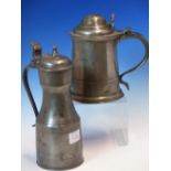 THOMAS BANCKES, WIGAN, A PEWTER LIDDED TANKARD WITH SCROLL THUMBPIECE. H 18cms.TOGETHER WITH A