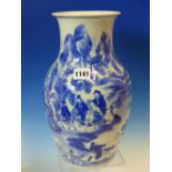 A CHINESE BLUE AND WHITE BALUSTER VASE PAINTED WITH RIDERS TRAVELLING THE SHORELINE OF A ROCKY