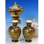 A PAIR OF CROWN DERBY GILT ON BLUE OVOID VASES. H 15cms. FOUR CROWN DERBY IMARI COFFEE CANS AND